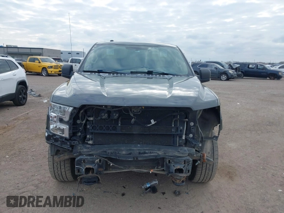 2015 Ford F-150 XLT with VIN 1FTEW1EGXFFA08354, listed as a IAAI auction lot 41627569 with 125,940 mi miles and . Bid and sale history available at DreamBid. Image 13.