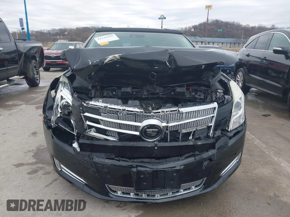 2013 Cadillac XTS Platinum z VIN 2G61V5S37D9194227, wystawiony jako IAAI lot #41510449 z przebiegiem 114 243 mil mil oraz . Historia ofert i sprzedaży dostępna na DreamBid. Obrazek 12.