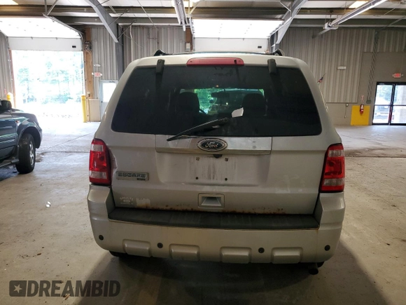 2012 Ford Escape Limited z VIN 1FMCU9E70CKB00745, wystawiony jako Copart lot #65906645 z przebiegiem 126 548 mil mil oraz Czysty tytuł • Clean title. Historia ofert i sprzedaży dostępna na DreamBid. Obrazek 6.