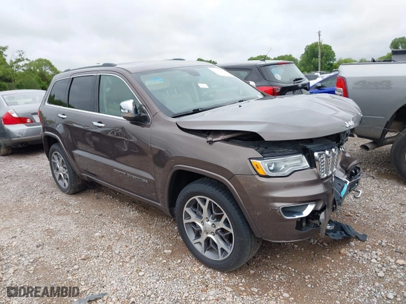 2020 Jeep Grand Cherokee Overland with VIN 1C4RJECG8LC323824, listed as a IAAI auction lot 41757922 with 64,792 mi miles. Bid and sale history available at carsss.com. Image 1.