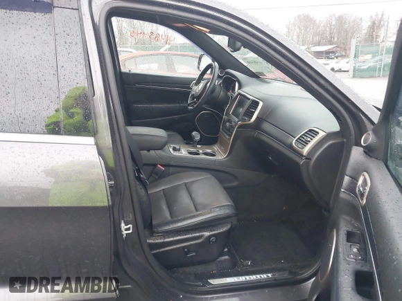 2015 Jeep Grand Cherokee Summit with VIN 1C4RJFJM6FC955904, listed as a IAAI auction lot 41483446 with 65,970 mi miles. Bid and sale history available at carsss.com. Image 8.