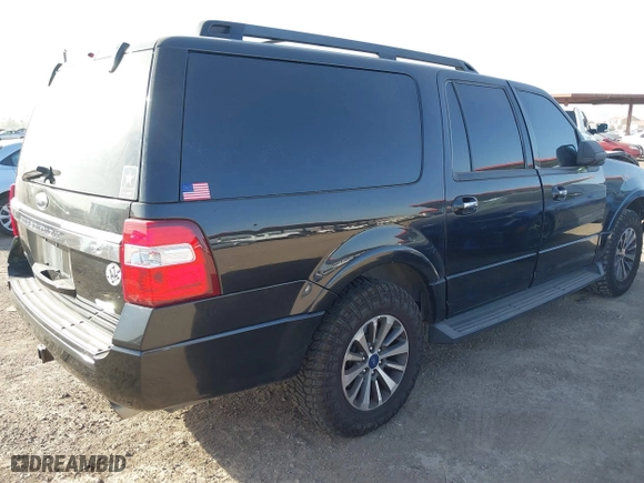 2015 Ford Expedition EL XLT with VIN 1FMJK1HT2FEF13504, listed as a IAAI auction lot 41698804 with 211,196 mi miles. Bid and sale history available at carsss.com. Image 4.