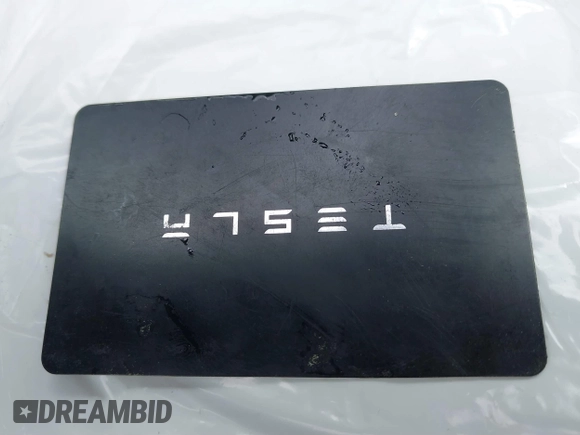 2021 Tesla Model 3 Long Range with VIN 5YJ3E1EB8MF860282, listed as a IAAI auction lot 41787008 with 49,730 mi miles and . Bid and sale history available at DreamBid. Image 11.