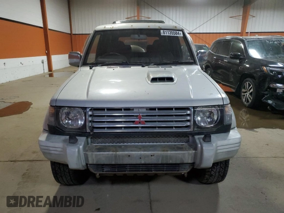 1995 Mitsubishi Montero z VIN 2BGF0126264046653, wystawiony jako Copart lot #81135584 z przebiegiem 254 106 mil mil oraz Czysty tytuł • Clean title. Historia ofert i sprzedaży dostępna na DreamBid. Obrazek 5.
