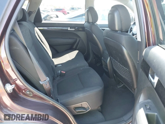 2015 Kia Sorento LX with VIN 5XYKTDA70FG604220, listed as a IAAI auction lot 42060598 with 128,180 mi miles and . Bid and sale history available at DreamBid. Image 8.