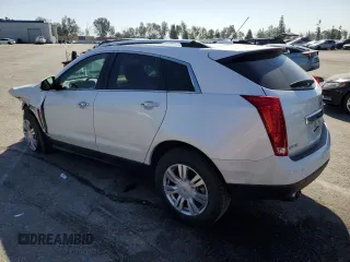2015 Cadillac SRX Luxury Collection with VIN 3GYFNBE34FS555989, listed as a Copart auction lot 52765485 with 93,988 mi miles and Salvage Title. Bid and sale history available at DreamBid. Image 2.