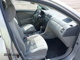 2009 Toyota Corolla with VIN 1NXBU40E49Z017630, listed as a IAAI auction lot 42204714 with 176,828 mi miles. Bid and sale history available at carsss.com. Image 5.