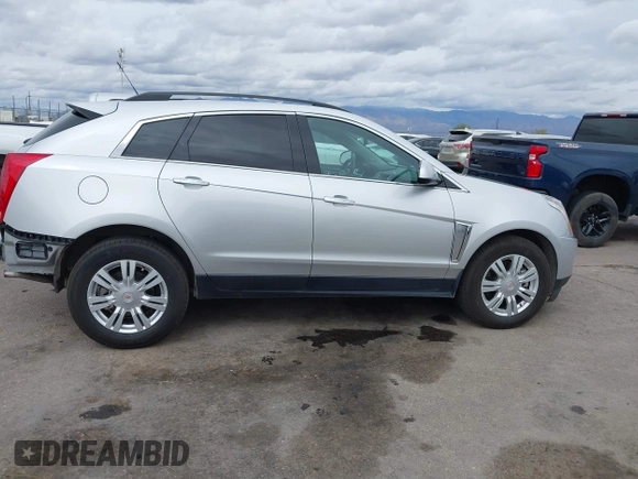2015 Cadillac SRX with VIN 3GYFNAE34FS629258, listed as a IAAI auction lot 41788601 with 56,939 mi miles and . Bid and sale history available at DreamBid. Image 14.
