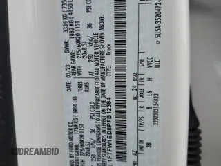 2023 Ford F-150 XL z VIN 1FTFW1ED8PFB12384, wystawiony jako Copart lot #61811455 z przebiegiem 17 664 mil mil oraz Szkoda całkowita • Salvage title. Historia ofert i sprzedaży dostępna na DreamBid. Obrazek 12.