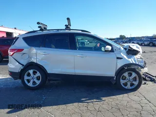 2016 Ford Escape SE with VIN 1FMCU9GX2GUB29249, listed as a IAAI auction lot 41545211 with 97,631 mi miles. Bid and sale history available at carsss.com. Image 14.
