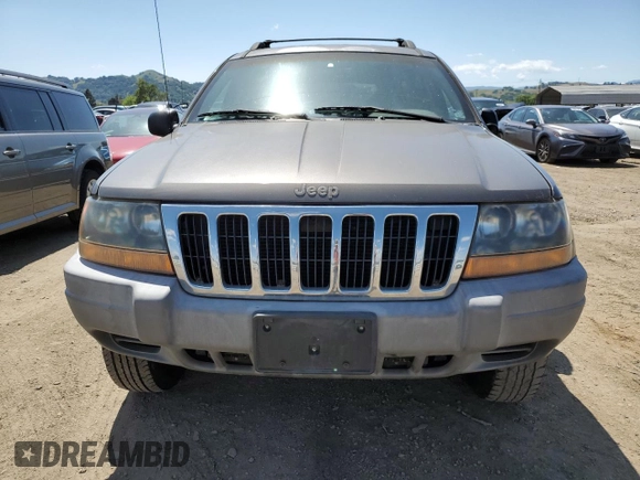 2000 Jeep Grand Cherokee Laredo with VIN 1J4G248S6YC333068, listed as a Copart auction lot 54972765 with 183,775 mi miles and Clean title. Bid and sale history available at DreamBid. Image 5.
