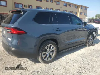 2024 Toyota Highlander XLE z VIN 5TDAAAA57RS002467, wystawiony jako Copart lot #56787135 z przebiegiem 16 495 mil mil oraz Szkoda całkowita • Salvage title. Historia ofert i sprzedaży dostępna na DreamBid. Obrazek 3.