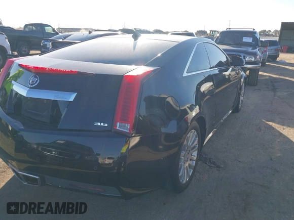 2011 Cadillac CTS Performance with VIN 1G6DK1ED9B0130927, listed as a IAAI auction lot 41414803 with 147,299 mi miles and . Bid and sale history available at DreamBid. Image 4.