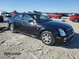 2009 Cadillac STS AWD z VIN 1G6DD67V690120833, wystawiony jako Copart lot #42502345 z przebiegiem 100 250 mil mil oraz Szkoda całkowita • Salvage title. Historia ofert i sprzedaży dostępna na DreamBid. Obrazek 4.