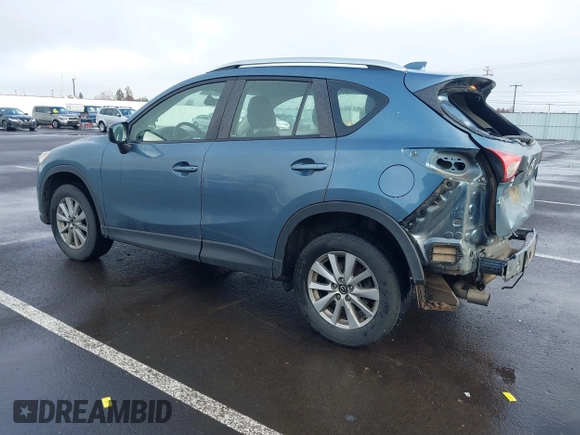 2015 Mazda CX-5 Sport with VIN JM3KE4BY0F0507727, listed as a IAAI auction lot 41249151 with 95,343 mi miles. Bid and sale history available at carsss.com. Image 3.