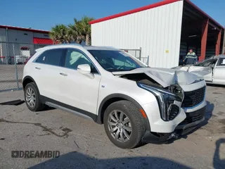 2021 Cadillac XT4 FWD Premium Luxury с VIN 1GYFZCR4XMF080010, выставлен на аукционе IAAI как лот 42098802 с пробегом 34 402 миль миль и . История ставок и продаж доступна на DreamBid. Изображение 1.
