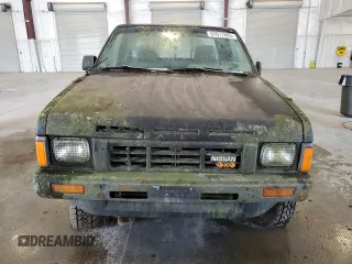 1986 Nissan Hardbody E z VIN 1N6ND16Y7GC413942, wystawiony jako Copart lot #57677605 z przebiegiem 126 183 mil mil oraz Tytuł czysty. Historia ofert i sprzedaży dostępna na DreamBid. Obrazek 5.