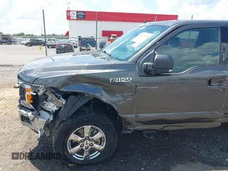 2019 Ford F-150 XL with VIN 1FTEW1E52KKE98899, listed as a IAAI auction lot 42576904 with 168,223 mi miles and . Bid and sale history available at DreamBid. Image 18.