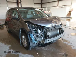 2015 Honda CR-V EX with VIN 3CZRM3H57FG706605, listed as a IAAI auction lot 41233942 with 112,842 mi miles and . Bid and sale history available at carsss.com. Image 1.