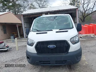 2023 Ford Transit Cargo with VIN 1FTBR1Y85PKA34934, listed as a IAAI auction lot 41768055 with 47,840 mi miles and . Bid and sale history available at DreamBid. Image 13.
