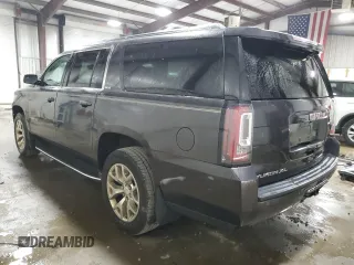 2016 GMC Yukon XL SLE with VIN 1GKS2FKC5GR335830, listed as a Copart auction lot 71294384 with 85,092 mi miles and Salvage Title. Bid and sale history available at carsss.com. Image 2.