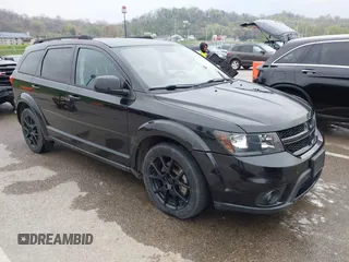 2013 Dodge Journey SXT with VIN 3C4PDDBG4DT660474, listed as a IAAI auction lot 41984607 with 124,926 mi miles and . Bid and sale history available at DreamBid. Image 1.