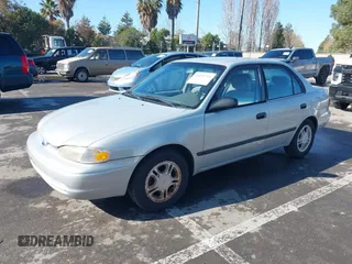 2000 Chevrolet Prizm z VIN 1Y1SK548XYZ426149, wystawiony jako IAAI lot #41495791 z przebiegiem 127 968 mil mil oraz . Historia ofert i sprzedaży dostępna na DreamBid. Obrazek 2.