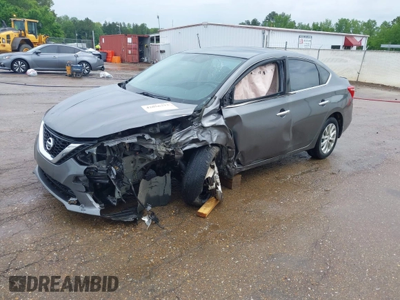 2019 Nissan Sentra S z VIN 3N1AB7AP7KY364754, wystawiony jako IAAI lot #42056332 z przebiegiem 170 068 mil mil oraz . Historia ofert i sprzedaży dostępna na DreamBid. Obrazek 18.