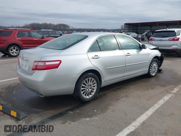 2009 Toyota Camry LE with VIN 4T1BK46K39U581157, listed as a IAAI auction lot 41827143 with 107,664 mi miles. Bid and sale history available at carsss.com. Image 4.