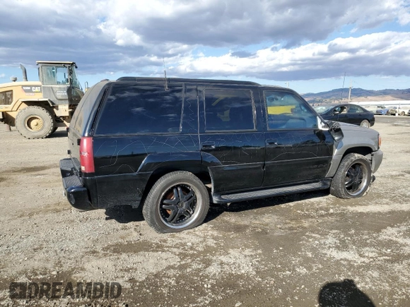 2000 GMC Denali z VIN 1GKEK13R8YR109690, wystawiony jako Copart lot #76165584 z przebiegiem 153 366 mil mil oraz Szkoda całkowita • Salvage title. Historia ofert i sprzedaży dostępna na DreamBid. Obrazek 3.