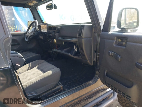2004 Jeep Wrangler Rubicon with VIN 1J4FA69S64P789308, listed as a IAAI auction lot 41714489 with 186,302 mi miles. Bid and sale history available at carsss.com. Image 5.