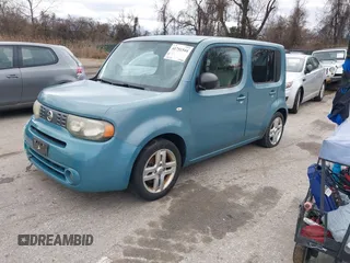 2010 Nissan Cube S z VIN JN8AZ2KRXAT170470, wystawiony jako IAAI lot #41751544 z przebiegiem 108 437 mil mil oraz . Historia ofert i sprzedaży dostępna na DreamBid. Obrazek 2.