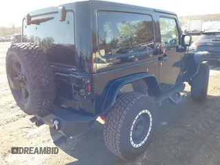 2011 Jeep Wrangler Rubicon with VIN 1J4HA6D14BL508098, listed as a IAAI auction lot 41423284 with 49,840 mi miles and . Bid and sale history available at carsss.com. Image 4.