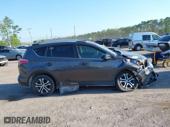 2016 Toyota RAV4 LE with VIN JTMZFREV7GJ065267, listed as a IAAI auction lot 42011267 with 180,127 mi miles. Bid and sale history available at carsss.com. Image 13.