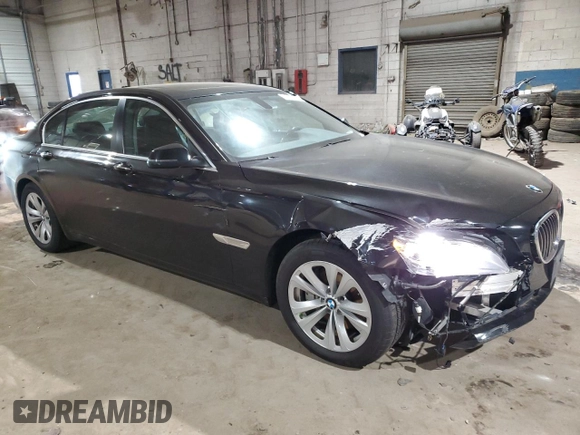 2015 BMW 7 Series 740Li xDrive with VIN WBAYF4C55FG291706, listed as a Copart auction lot 41992355 with 76,483 mi miles and Salvage Title. Bid and sale history available at carsss.com. Image 4.