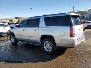 2018 GMC Yukon XL SLT with VIN 1GKS2GKC1JR198012, listed as a Copart auction lot 42400965 with 155,496 mi miles and Salvage Title. Bid and sale history available at carsss.com. Image 2.