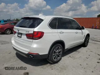 2015 BMW X5 xDrive35i with VIN 5UXKR0C52F0P07288, listed as a Copart auction lot 51697585 with 111,896 mi miles and Salvage Title. Bid and sale history available at carsss.com. Image 3.