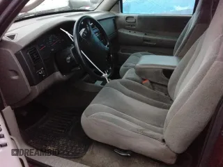2003 Dodge Dakota SLT with VIN 1D7HL42N23S226033, listed as a Copart auction lot 83297194 with 0 mi miles and Salvage Title. Bid and sale history available at carsss.com. Image 7.