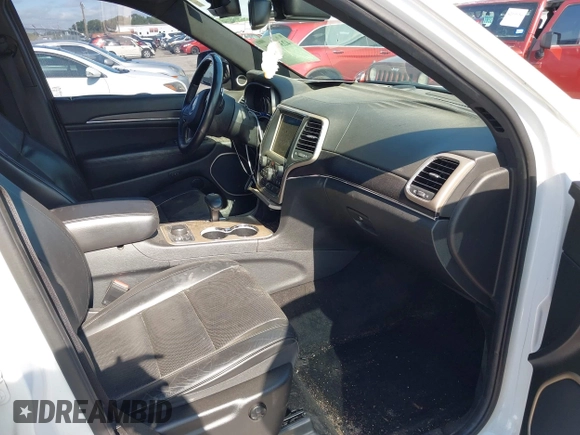 2014 Jeep Grand Cherokee Summit with VIN 1C4RJFJT3EC523129, listed as a IAAI auction lot 42341296 with 171,468 mi miles and . Bid and sale history available at DreamBid. Image 5.
