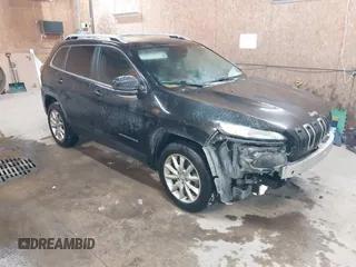 2014 Jeep Cherokee Limited z VIN 1C4PJMDS0EW240958, wystawiony jako IAAI lot #41541340 z przebiegiem 140 625 mil mil oraz . Historia ofert i sprzedaży dostępna na DreamBid. Obrazek 1.