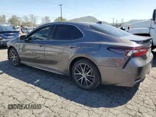 2023 Toyota Camry SE z VIN 4T1G11AK9PU832730, wystawiony jako Copart lot #49294455 z przebiegiem 46 194 mil mil oraz Szkoda całkowita • Salvage title. Historia ofert i sprzedaży dostępna na DreamBid. Obrazek 2.