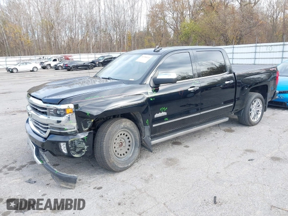 2016 Chevrolet Silverado 1500 High Country with VIN 3GCUKTEC2GG344953, listed as a IAAI auction lot 40700121 with 107,623 mi miles and . Bid and sale history available at DreamBid. Image 2.