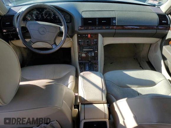 1995 Mercedes-Benz S with VIN WDBGA51E3SA273738, listed as a Copart auction lot 49763925 with 148,066 mi miles and Clean Title. Bid and sale history available at DreamBid. Image 8.