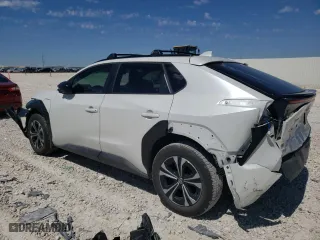 2024 Toyota bZ4X XLE with VIN JTMAAAAA1RA034325, listed as a Copart auction lot 70812224 with 10,164 mi miles and Salvage Title. Bid and sale history available at carsss.com. Image 2.