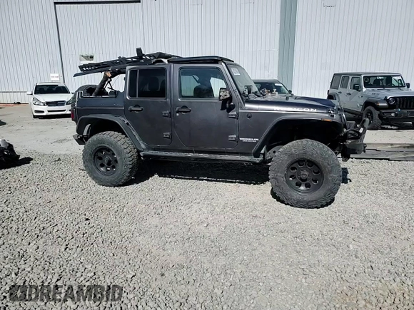 2014 Jeep Wrangler Unlimited Rubicon with VIN 1C4BJWFG0EL274480, listed as a Copart auction lot 48201845 with 130,503 mi miles and Salvage Title. Bid and sale history available at carsss.com. Image 14.