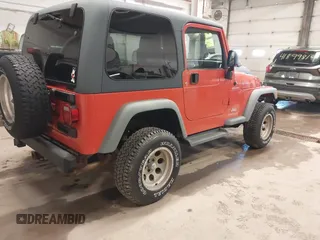 2006 Jeep Wrangler Sport with VIN 1J4FA49S06P729497, listed as a IAAI auction lot 41906227 with 134,573 mi miles. Bid and sale history available at carsss.com. Image 4.