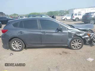 2018 Subaru Impreza with VIN 4S3GTAA63J3748319, listed as a IAAI auction lot 42441310 with 71,616 mi miles and . Bid and sale history available at DreamBid. Image 13.