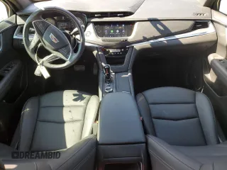 2023 Cadillac XT5 FWD Luxury z VIN 1GYKNAR45PZ191436, wystawiony jako Copart lot #45653615 z przebiegiem 15 044 mil mil oraz Szkoda całkowita • Salvage title. Historia ofert i sprzedaży dostępna na DreamBid. Obrazek 8.