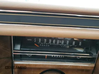 1988 Cadillac Brougham z VIN 1G6DW51Y5J9727006, wystawiony jako Copart lot #70573614 z przebiegiem 34 628 mil mil oraz Szkody całkowita. Historia ofert i sprzedaży dostępna na DreamBid. Obrazek 9.