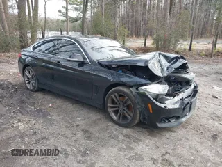 2017 BMW 4 Series 430i xDrive z VIN WBA4F9C54HG440122, wystawiony jako IAAI lot #41615681 z przebiegiem 121 938 mil mil oraz . Historia ofert i sprzedaży dostępna na DreamBid. Obrazek 1.